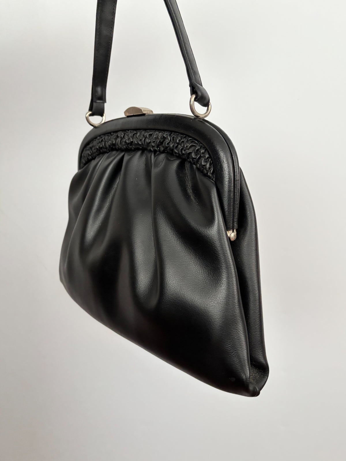 1960s Black Vinyl Handbag with Gathered Detail and Metal Frame
