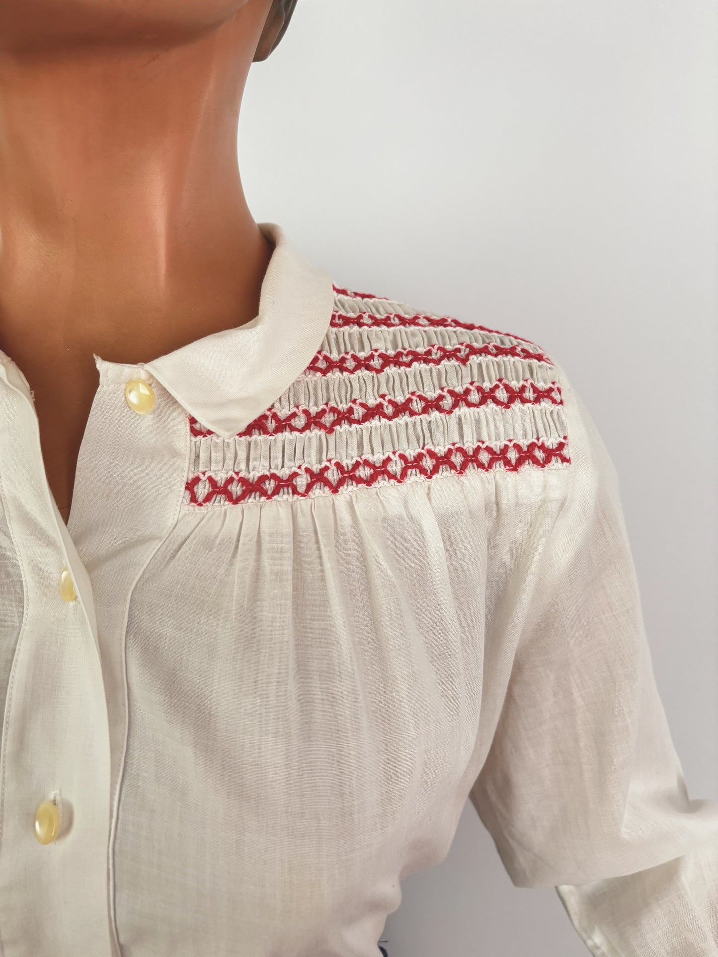 1950s White Cotton Batiste Blouse With Red Smocked Shoulder Detail | S