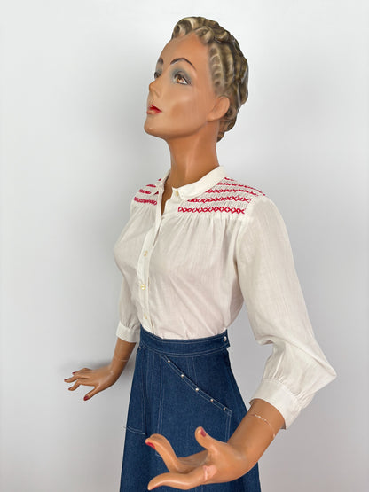 1950s White Cotton Batiste Blouse With Red Smocked Shoulder Detail | S